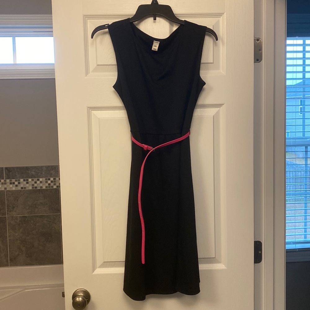 Black, knee length dress.